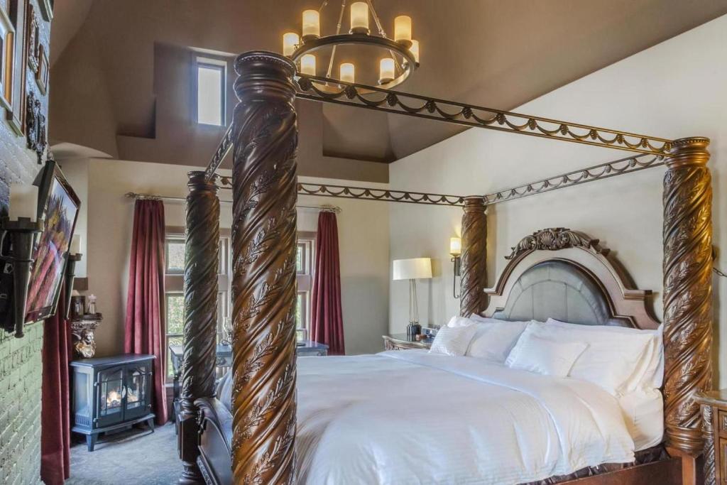 Patterson Inn Room with an antique wooden bed